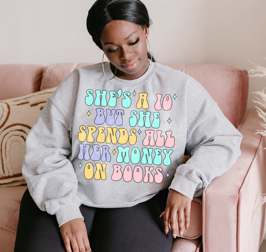 SPENDS MONEY ON BOOKS  DIGITAL DESIGN